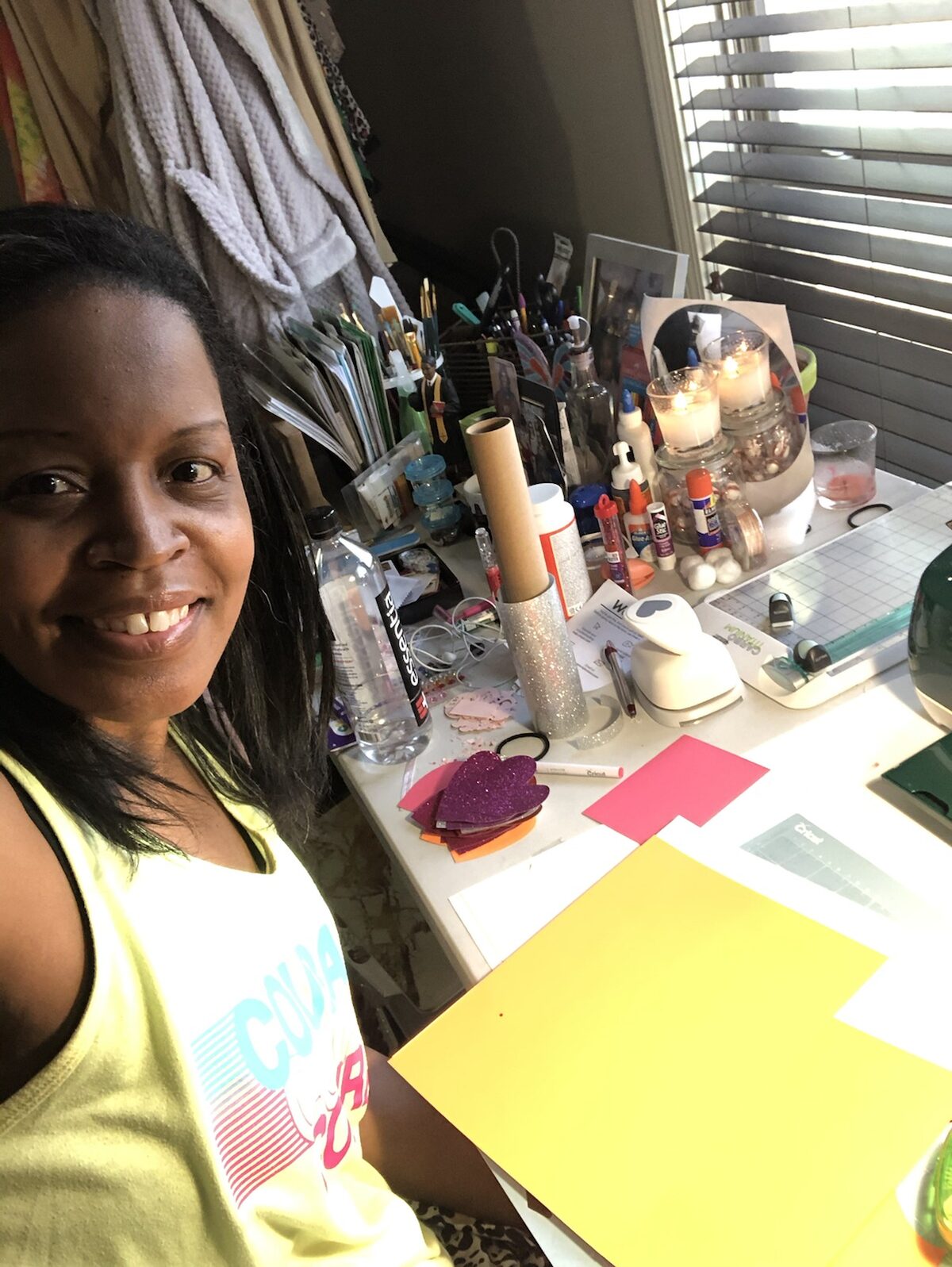 Kimmie crafting cards in her studio
